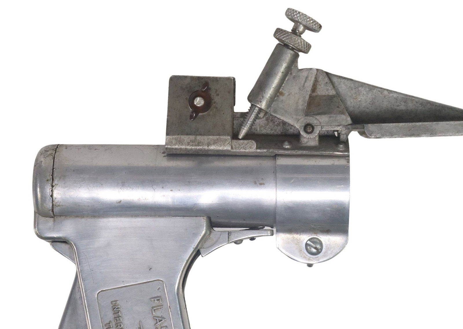 SCARCE INTL FLASHLIGHT PISTOL: INTERNATIONAL SIGNAL PISTOL, marked at the grips "Flashlight Pistol, Patented, wings with centered Driggs Faber System, International Flare-Signal Co., Tippecanoe City, Ohio", name and addre