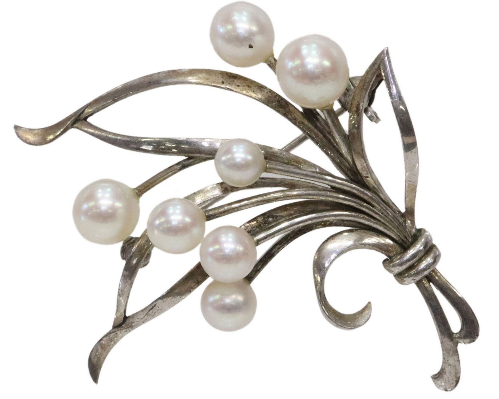 ESTATE MIKIMOTO SILVER & CULTURED PEARL FLORAL SPRAY BROOCH: Estate Mikimoto silver brooch/ pin, floral spray with seven cultured pearls, approx 2"h, 1.75"w, 8.3 grams (inclusive of all materials) 