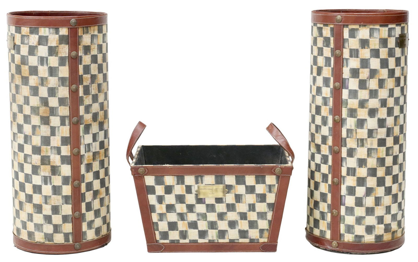 (3) MACKENZIE-CHILDS 'COURTLY CHECK' UMBRELLA STANDS & BASKET: (lot of 3) Mackenzie Childs "Courtly Check" housewares, each in checkerboard linen upholstery with burgundy leather trim, maker's plaque at side, including: (2) umbrella/ stick stands, b