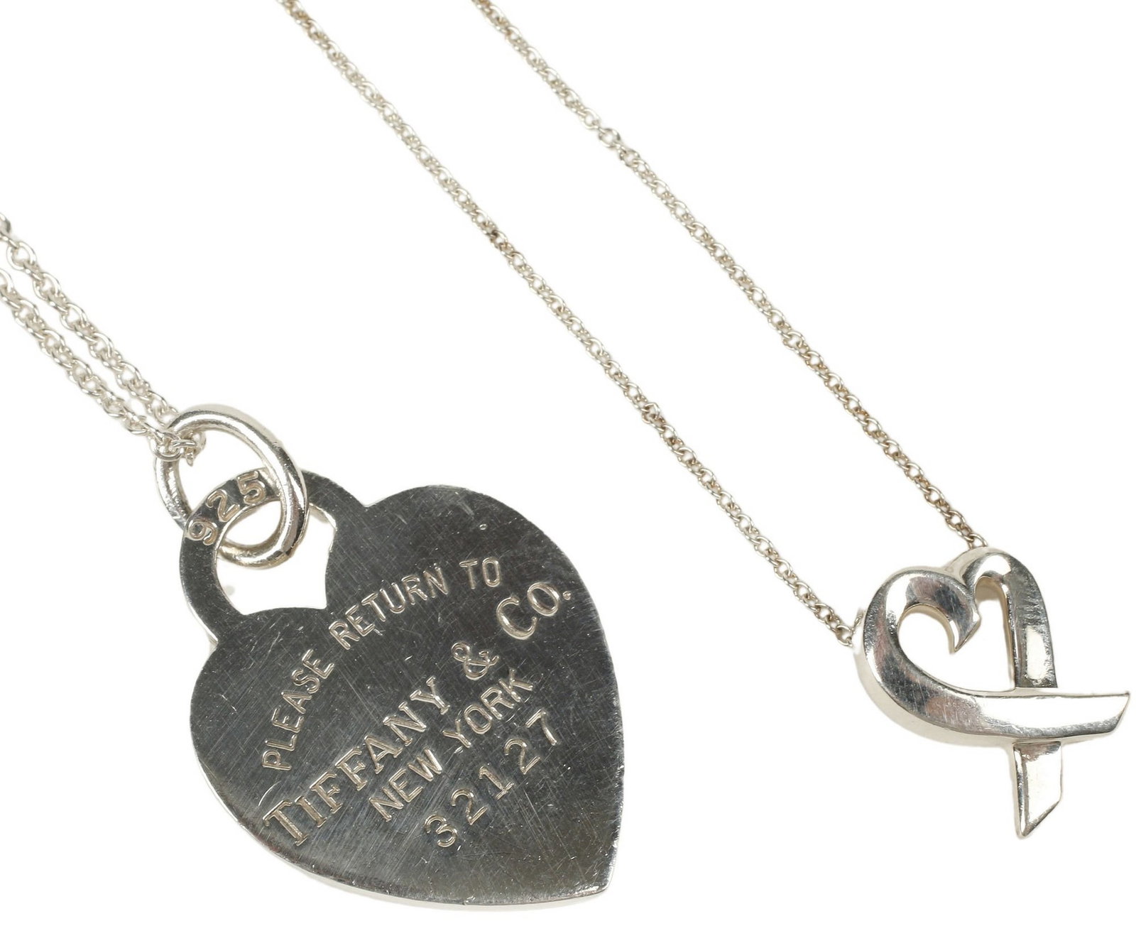 (2) TIFFANY & CO. STERLING SILVER HEART PENDANT NECKLACES: (lot of 2) Tiffany & Co. sterling silver necklaces, including: (1) 'Return to Tiffany' heart tag pendant necklace, on adjustable chain, spring ring clasp, approx 15.25"l; (1) 'Lov