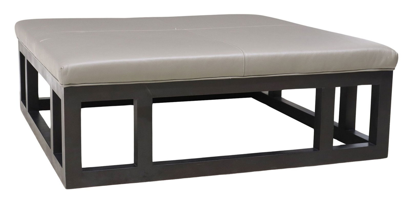 OVERSIZED MITCHELL GOLD + BOB WILLIAMS COFFEE TABLE OTTOMAN: Large modern upholstered ottoman, Mitchell Gold + Bob Williams (North Carolina), 21st c., having square top with grey leather upholstery, over straight wood frame, retaining maker's tag under