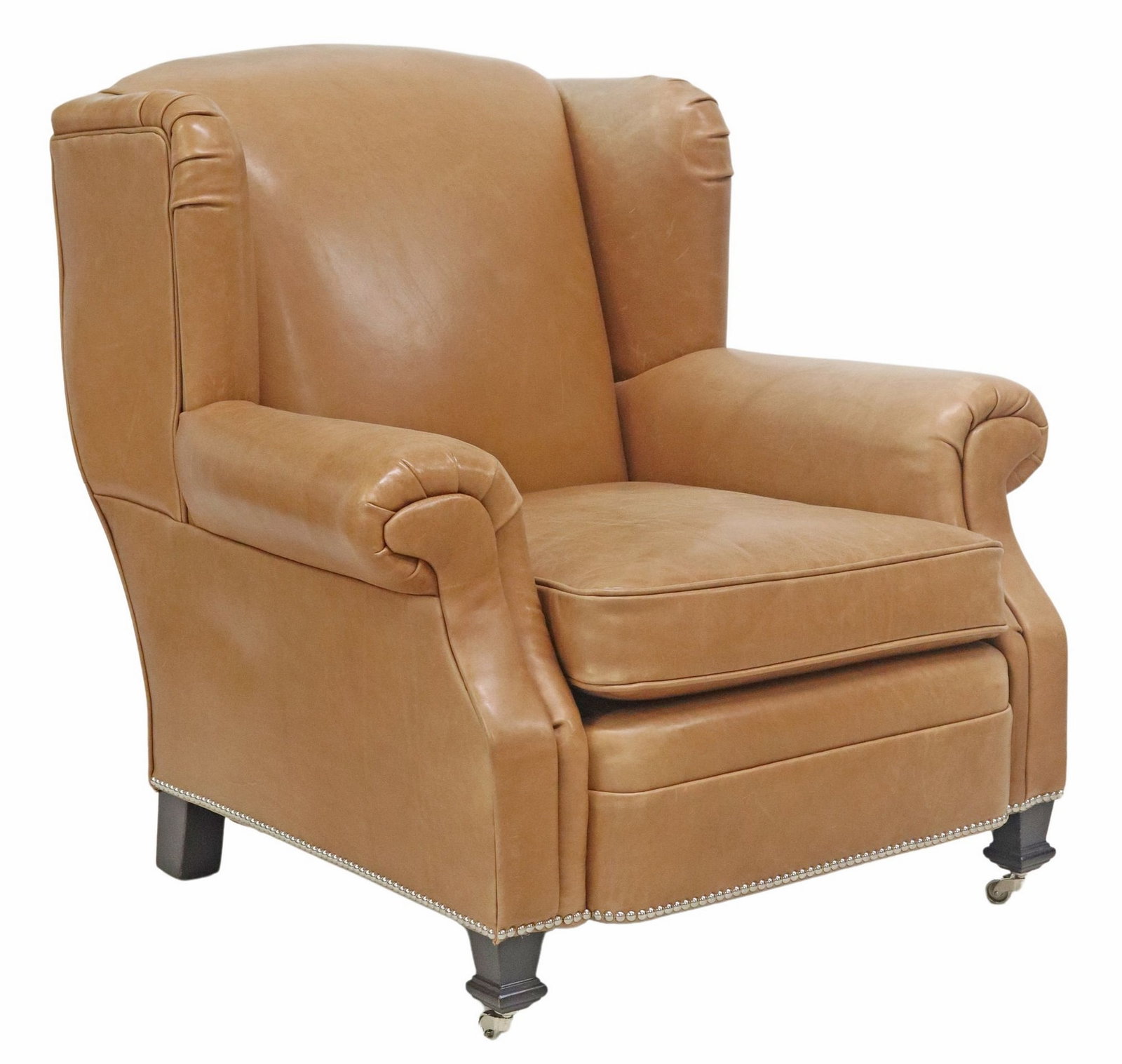 RALPH LAUREN HOME BROWN LEATHER WING ARMCHAIR: English-style leather armchair, Ralph Lauren Home, manufactured by E.J. Victor, Inc., North Carolina, 21st c., winged seat back, pleated roll arms, loose seat cushion, trimmed with nail-heads, front l