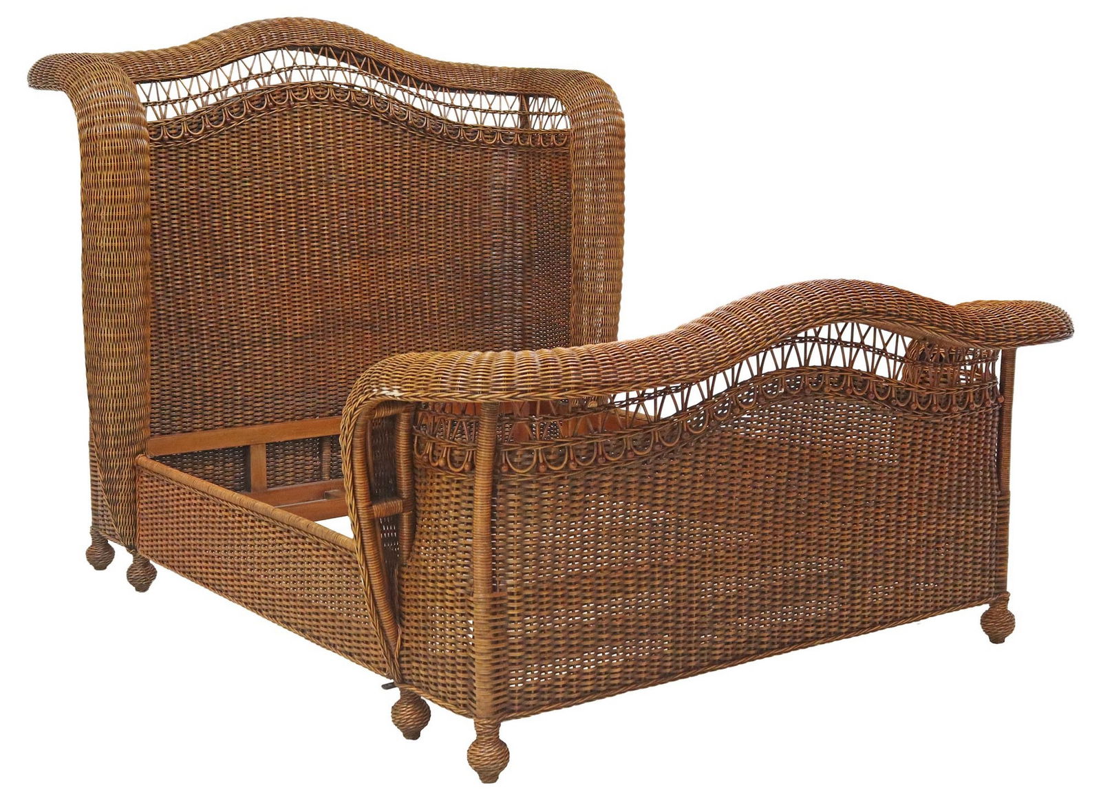 RALPH LAUREN (ATTRIB) BROWN WICKER QUEEN-SIZE BED: Queen-size wicker bed, attributed to Ralph Lauren, unmarked, having rounded headboard and baseboard with openwork border, rising on spherical feet, exterior: approx 67"h, 100"l, 74"