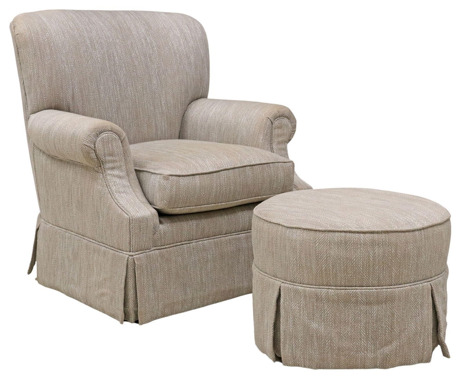 (2) CONTEMPORARY FABRIC UPHOLSTERED ARMCHAIR & OTTOMAN: (lot of 2) Upholstered seating group, attributed by consignor to Ralph Lauren, 21st c., each in textured fabric upholstery, with skirted base concealing cylindrical feet, including: (1) armchair,