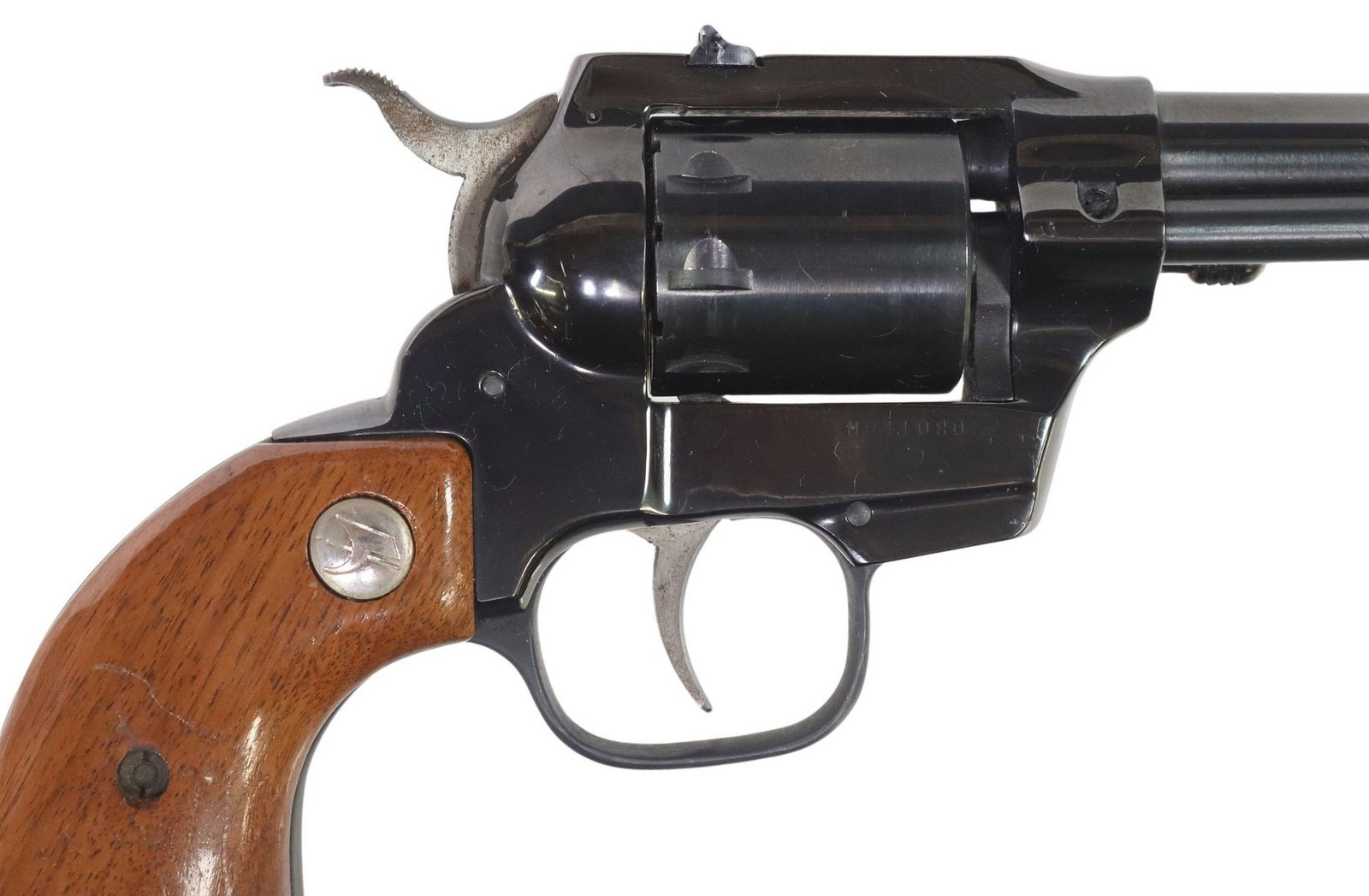 HIGH STANDARD .22 DOUBLE NINE REVOLVER: High Standard Double Nine Convertible Revolver, double action, 5.5" barrel, fixed front and rear sights, nine round swing out cylinder with spare cylinder, push rod shell ejector, wood logo grips