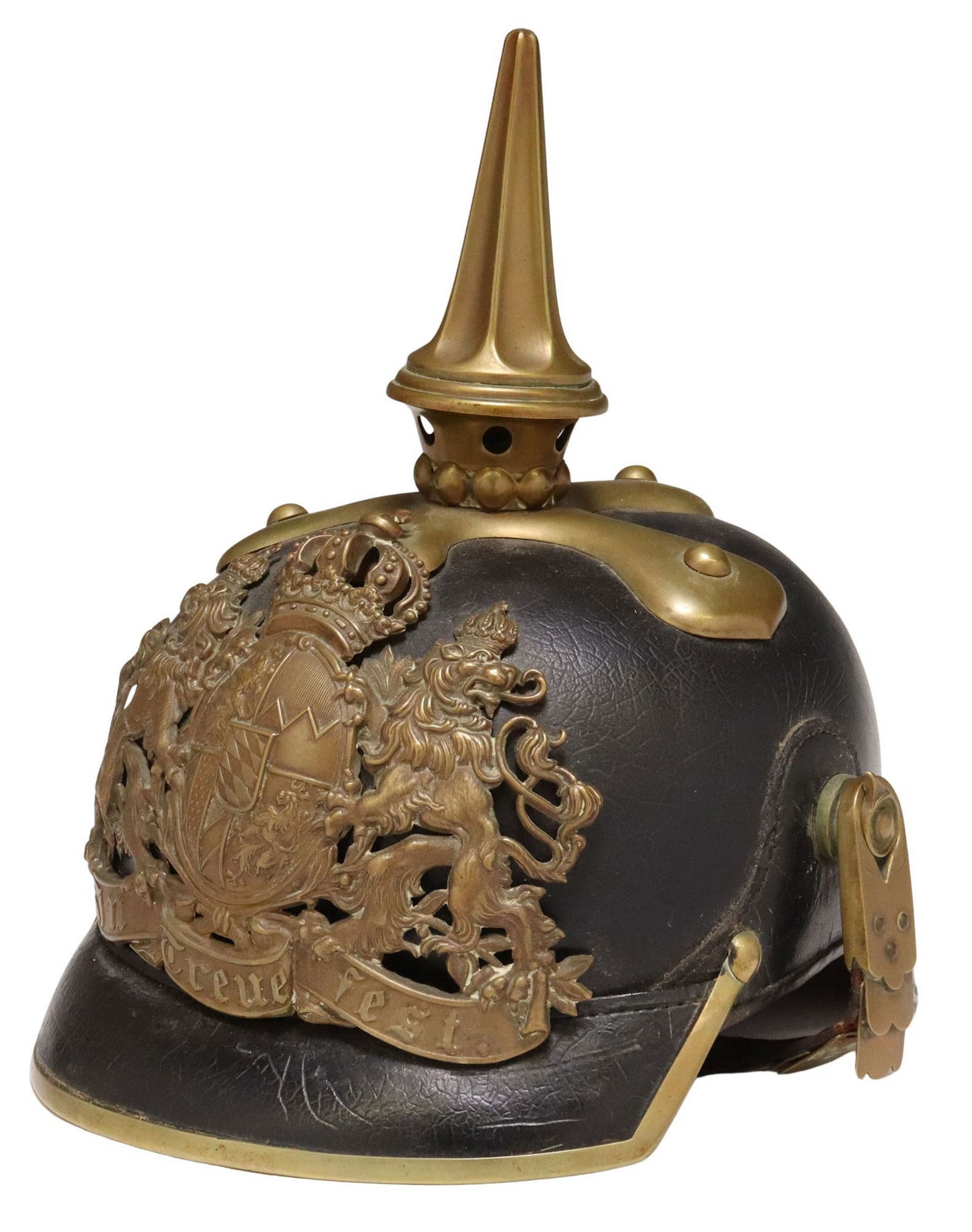 IMPERIAL GERMAN WWI-ERA BAVARIAN SPIKED PICKELHAUBE HELMET: Imperial German WWI-era pickelhaube helmet, fitted with metal front plate depicting the Bavarian coat of arms, above inscribed motto "In Treue Fest (In Faithful Celebration," black