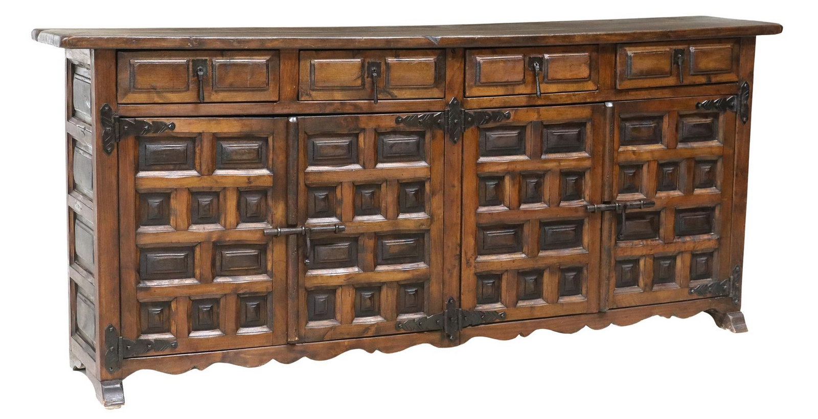 SPANISH COLONIAL STYLE IRON-MOUNTED PINE BUFFET SIDEBOARD: Spanish Colonial style pine buffet/ server, 20th c., paneled rectangular case fitted with four drawers, above four cabinet doors, revealing shelved interior, with patinated iron hinges and locks,