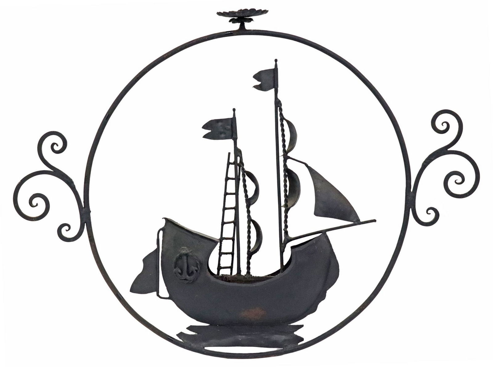 WROUGHT IRON HANGING ARCHITECTURAL ELEMENT WITH SAILING SHIP: Continental wrought iron hanging architectural element/ sign, having circular frame with scrolled elements at sides, encasing central sailing ship, approx 26"h, 34.5"w, 5.5"d