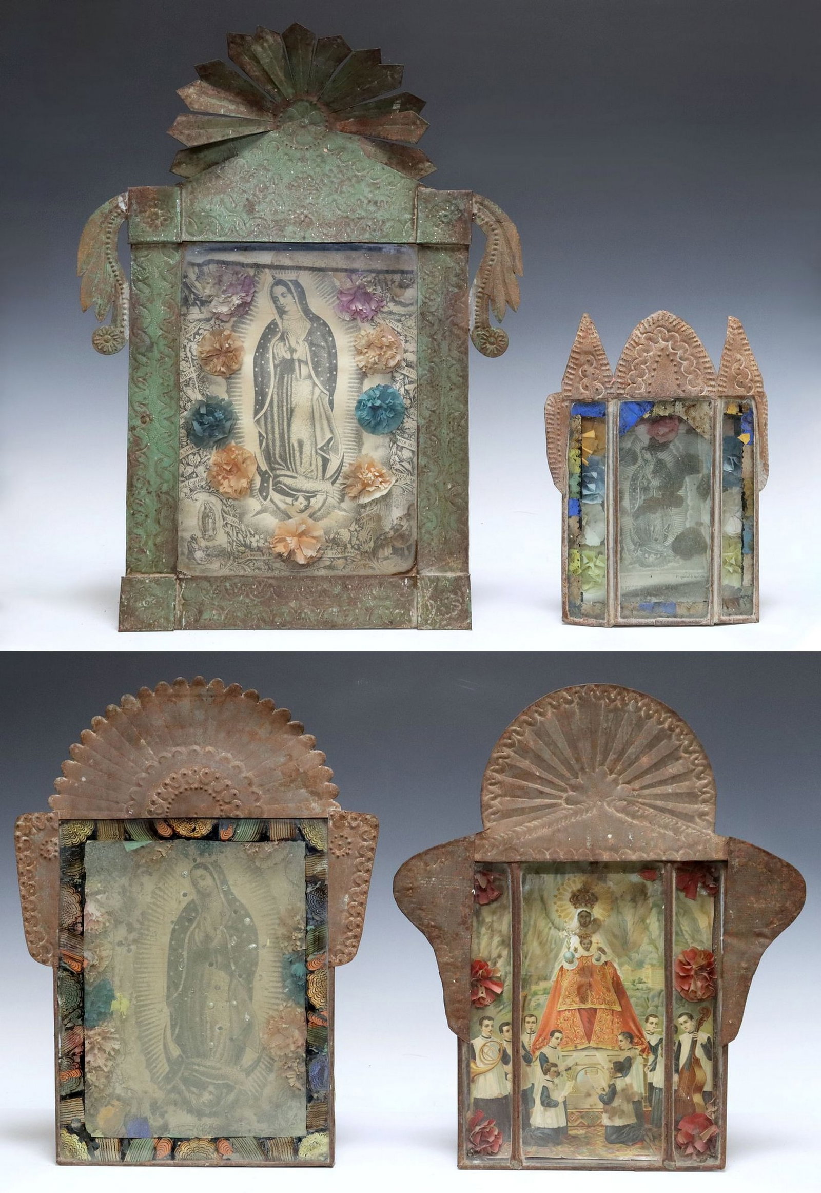 (4) FRAMED RELIGIOUS RETABLO PRINTS, MEXICO: (lot of 4) Framed retablo prints, Mexico, each housed in an embossed metal nicho/ frame, including: (3) La Virgen de Guadalupe, with paper flowers, (1) The Virgin of Montserrat, largest retablo: 