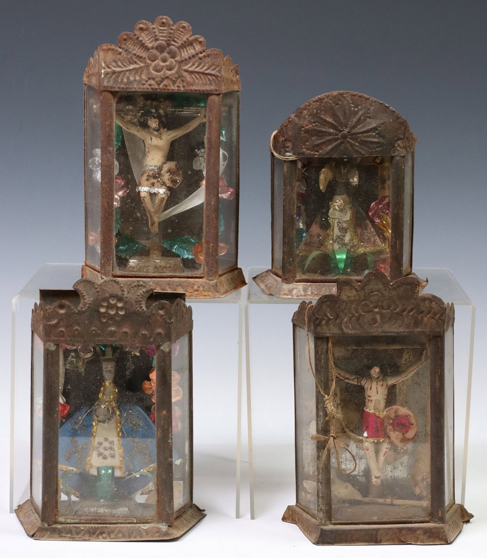 (4) RELIGIOUS ALTAR NICHOS, MEXICO, CRUCIFIXION & VIRGEN DE GUADALUPE: (lot of 4) Altar nichos with figures, Mexico, each housed in embossed tin frame with glazed panels and applied flowers, including: (2) La Crucifixion (The Crucifixion), (2) La Virg
