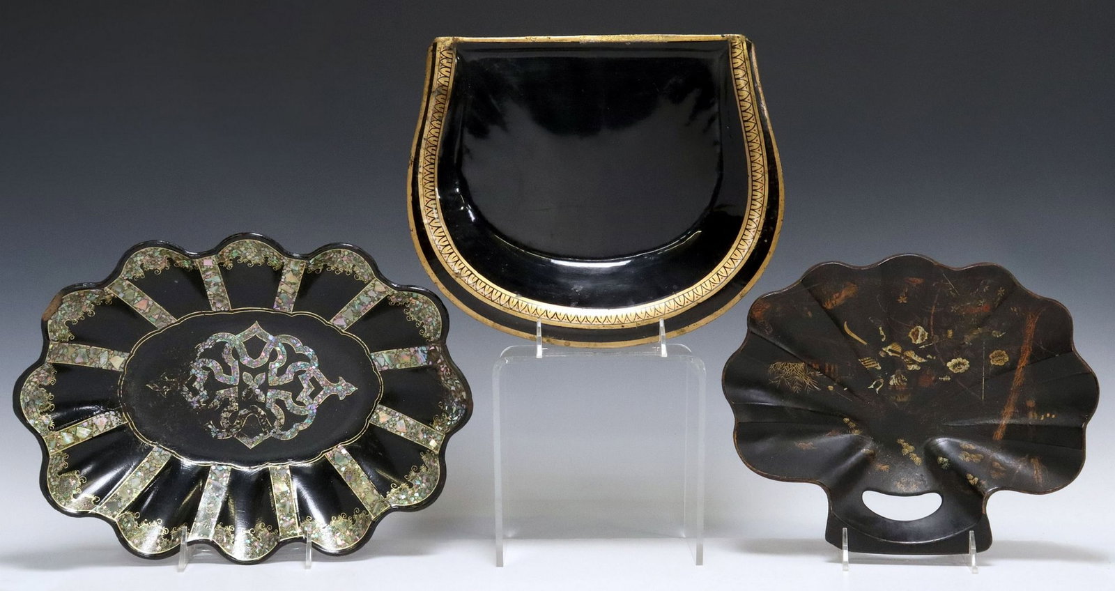 (3) LACQUERED PAPIER-MACHE & TOLE-PEINTE TRAYS: (lot of 3) Trays, including: (1) tole-peinte crumb tray, approx 9.5"l, 11.5"w, (1) Chinoiserie lacquered papier-mache shell-form crumb tray, small loss to underside corner of handle, approx 
