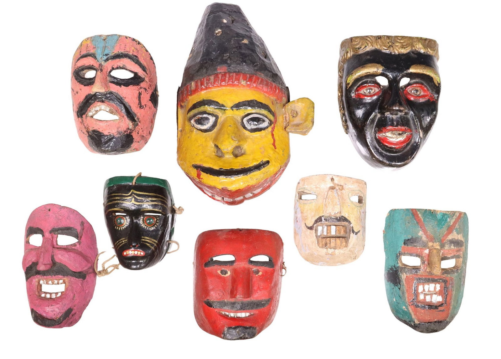 (8) FOLK ART POLYCHROME CARVED WOOD DANCE MASKS: (8) Collection of folk art polychromed carved figural wood dance masks, highlights include: (3) painted with silver accents on teeth, (one) Tepemaxac, Mexico, (one) Atlapexco, Mexico, (one) incised &q