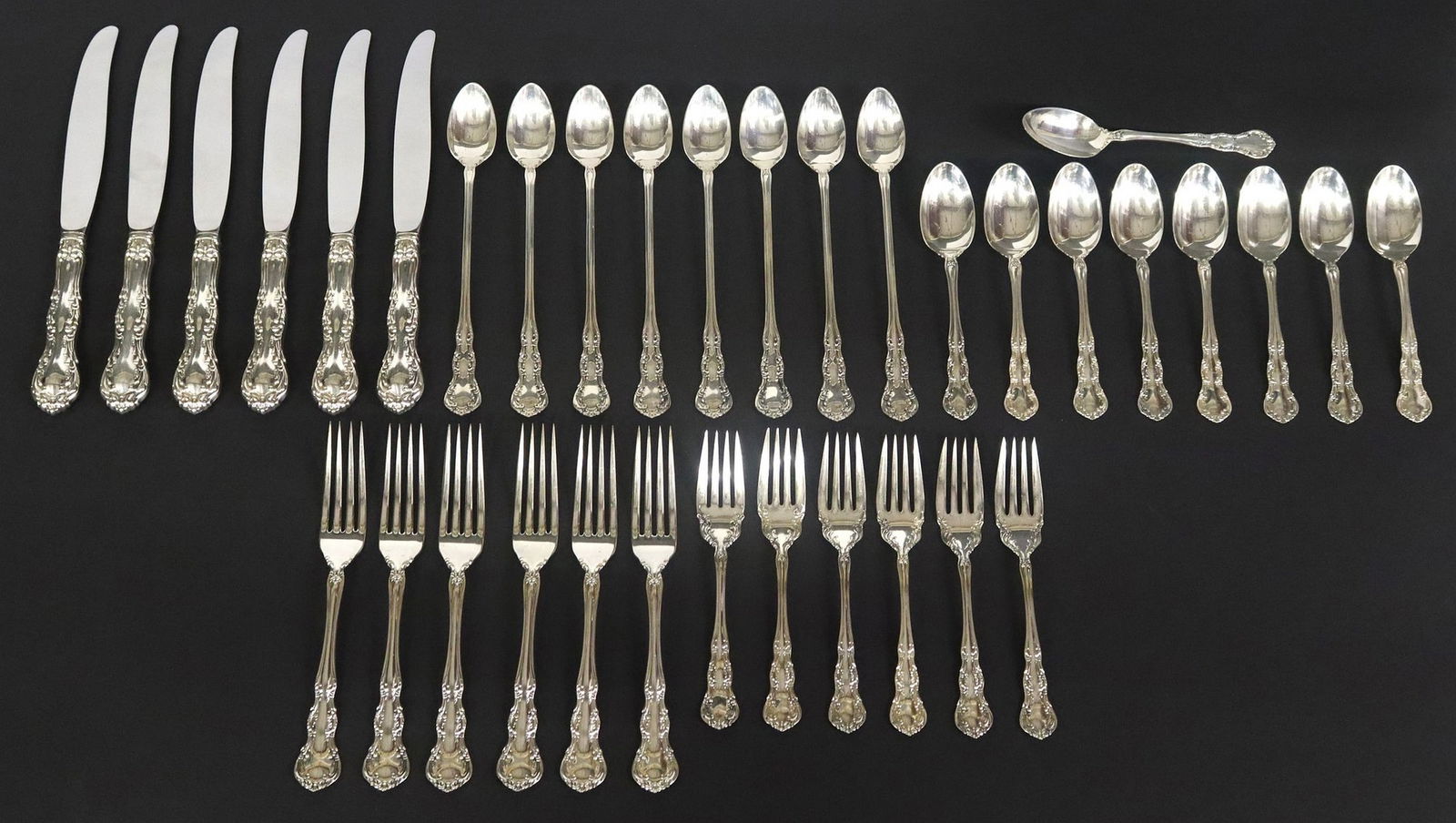 (35) WALLACE 'OLD ATLANTA' STERLING SILVER FLATWARE SERVICE: (set of 35) American sterling silver flatware service, Wallace Silversmiths, in the "Old Atlanta" pattern, including: (6) hollow knives, stainless steel blades, approx 9.75"l; (6)