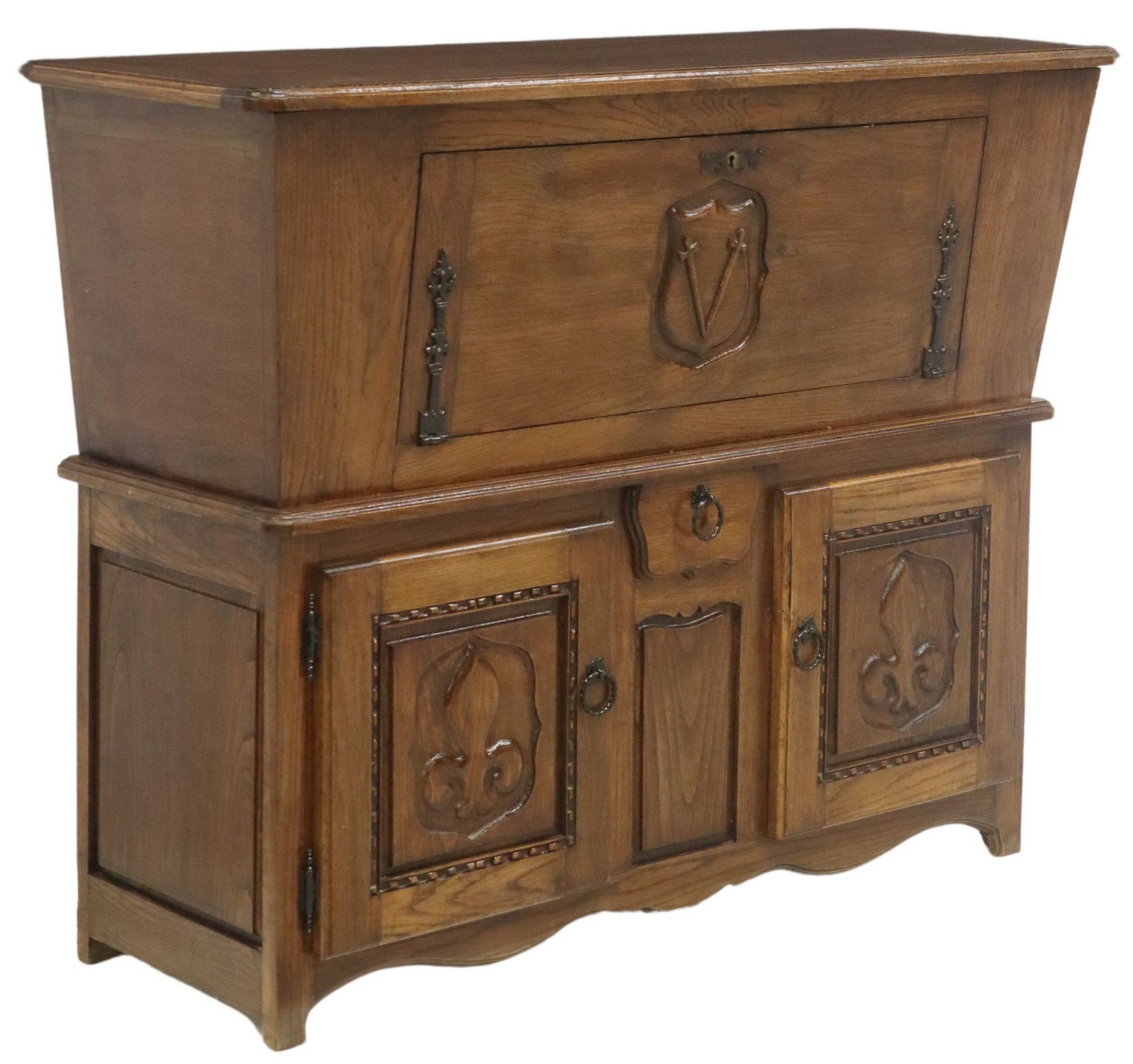 FRENCH CARVED OAK TWO-TIER DOUGH BIN CABINET: French carved oak two-tier dough bin cabinet, 20th c., having rectangular top, over drop front panel with carved "V," open interior, over small central drawer, flanked by two cabinet d