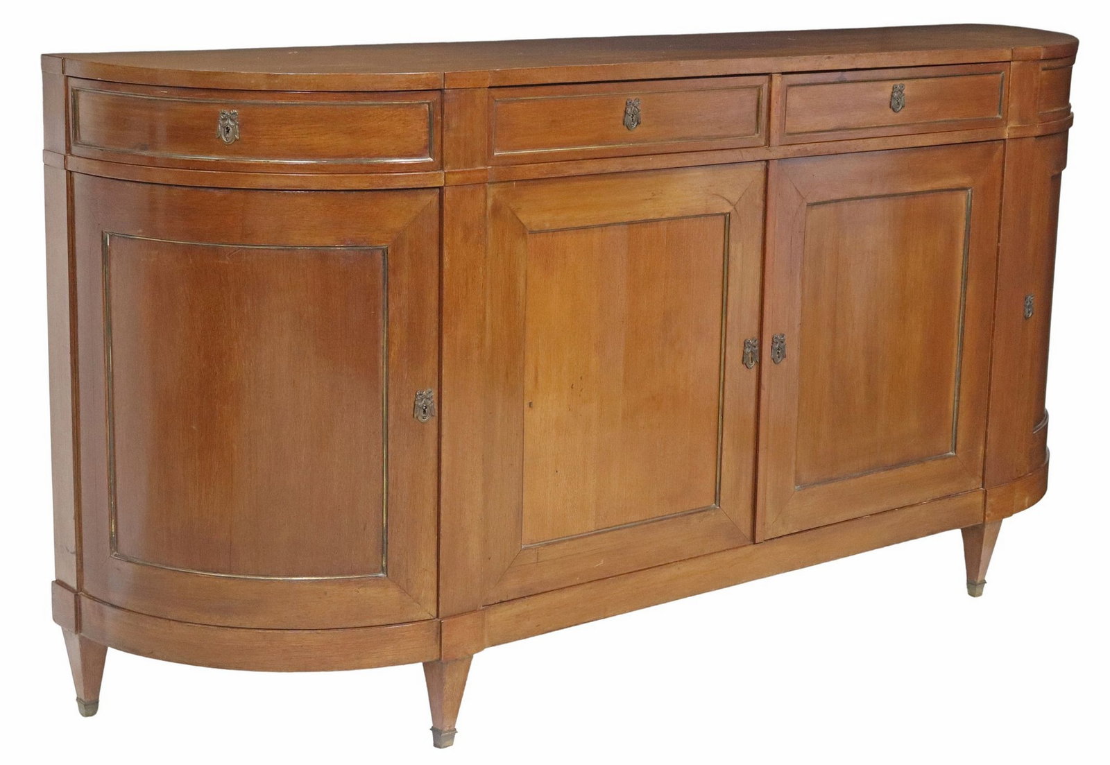 FRENCH LOUIS XVI STYLE MAHOGANY SIDEBOARD: French Louis XVI style mahogany sideboard, 20th c., having shaped top, case with curved ends, fitted with four drawers and four cabinet doors, ribbon crest escutcheons, rising on tapered legs,&nb