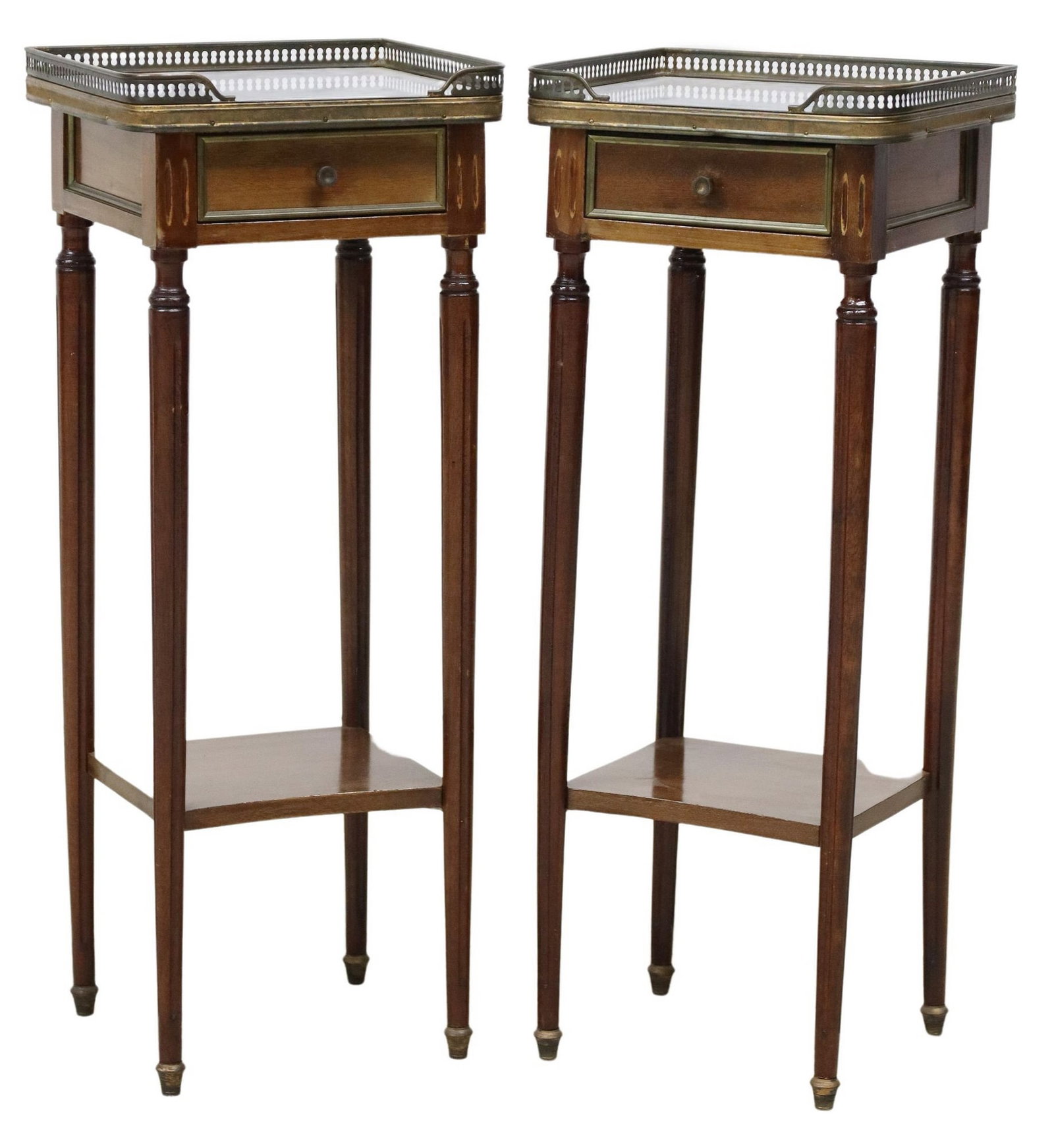 (2) FRENCH LOUIS XVI STYLE MAHOGANY NIGHTSTANDS / SIDE TABLES: (pair) French Louis XVI style mahogany nightstands / side tables, 20th c., having inset marble top with three quarter pierced gallery, over one drawer, lower shelf, rising on fluted and tapered suppor