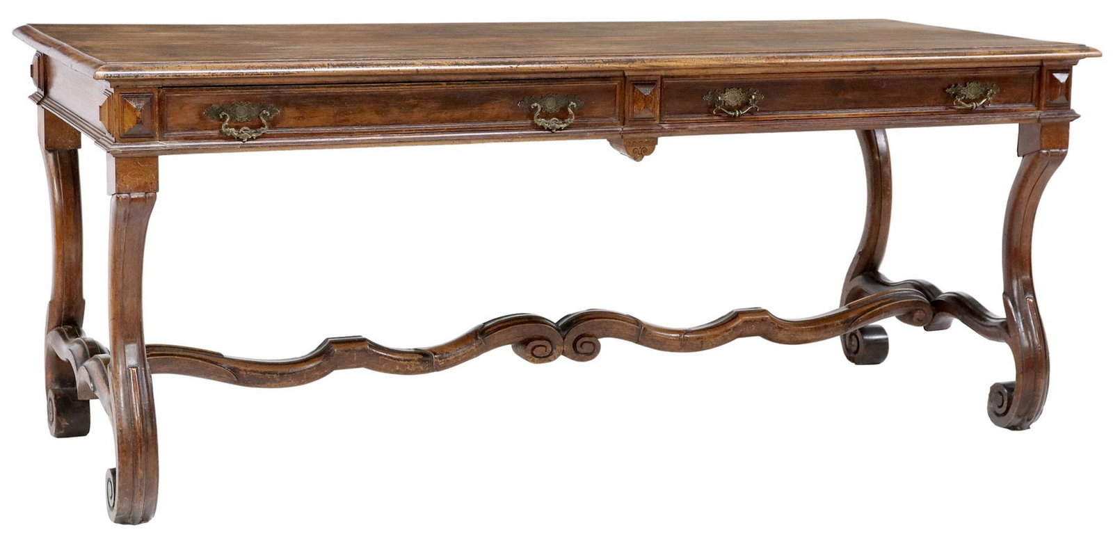 LARGE CONTINENTAL LIBRARY TABLE OR WRITING DESK: Large library table, early 20th c., rectangular top with molded edge, two frieze drawers, on volute supports joined by H stretcher, approx 31.75"h, 79.25"l, 30.75"w