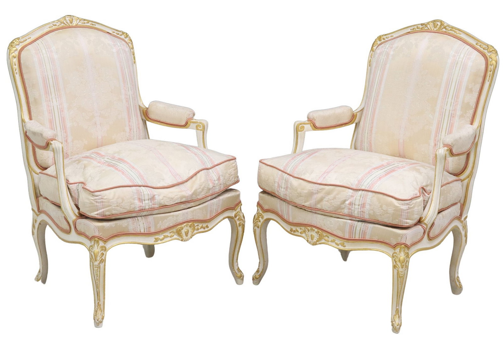 (2) FRENCH LOUIS XV STYLE PAINT DECORATED UPHOLSTERED ARMCHAIRS: (pair) French Louis XV style armchairs/ fauteuils, 20th c., each in a white finish with gilt painted trim, in floral patterned upholstery, with removable seat cushion, scrolled handholds, rising on ca