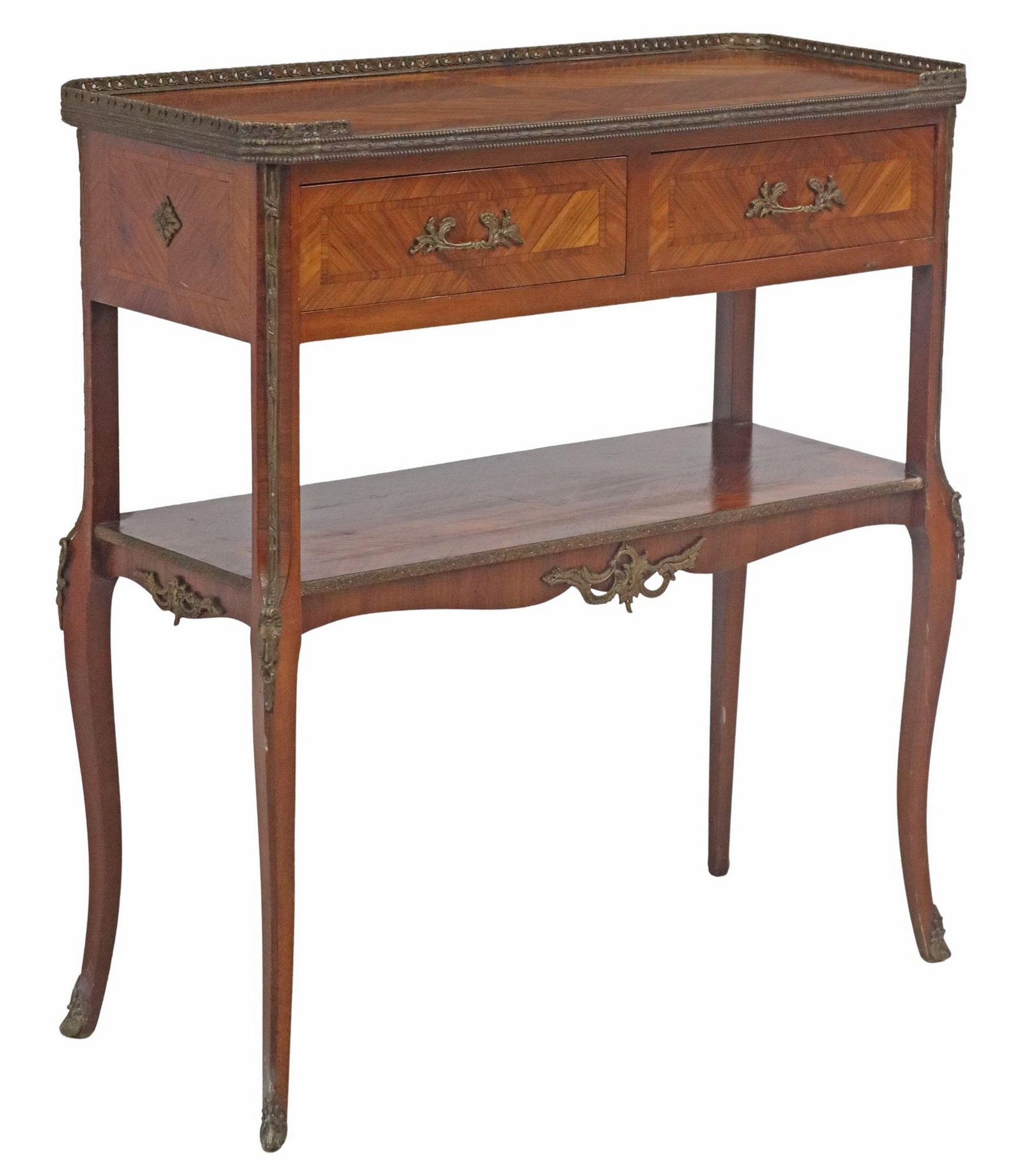 FRENCH TRANSITIONAL-STYLE SIDE TABLE: French transitional-style side table, 20th c., three-quarter gallery enclosing the banded top in diamond-matched veneers, over two frieze drawers, medial shelf, on gilt-metal sabots, finished on 