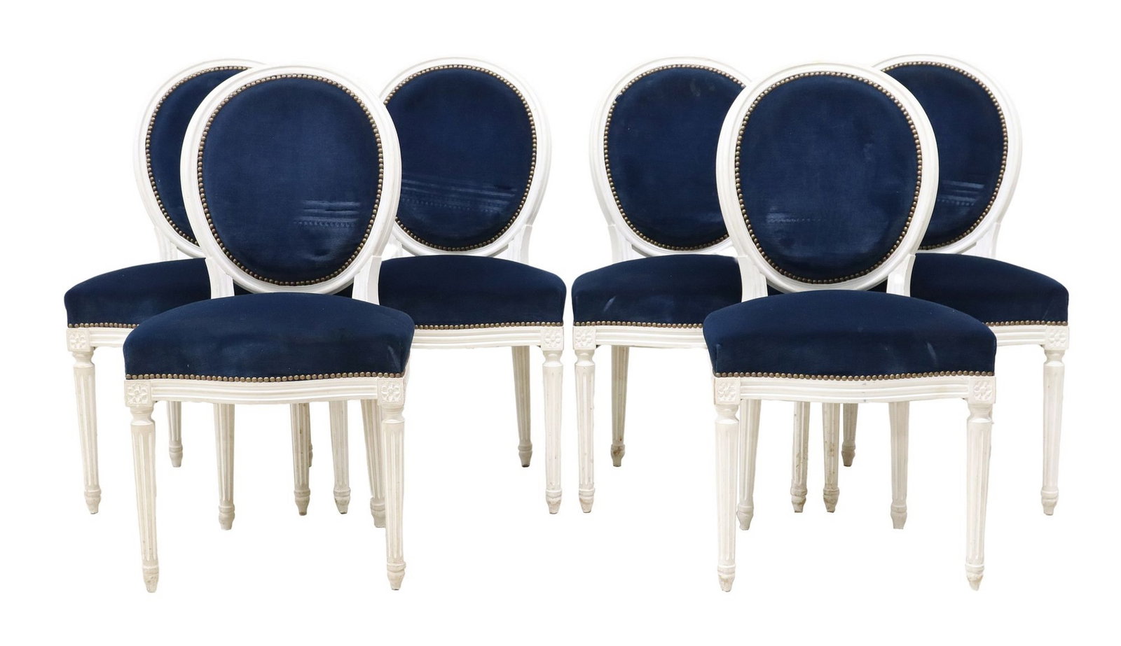 (6) FRENCH LOUIS XVI STYLE UPHOLSTERED OVAL DINING CHAIRS: (lot of 6) French Louis XVI style side chairs, early 20th c., each in a white painted finish, with oval medallion back and padded seat in later blue velvet upholstery, nailhead trim, rising on fluted 