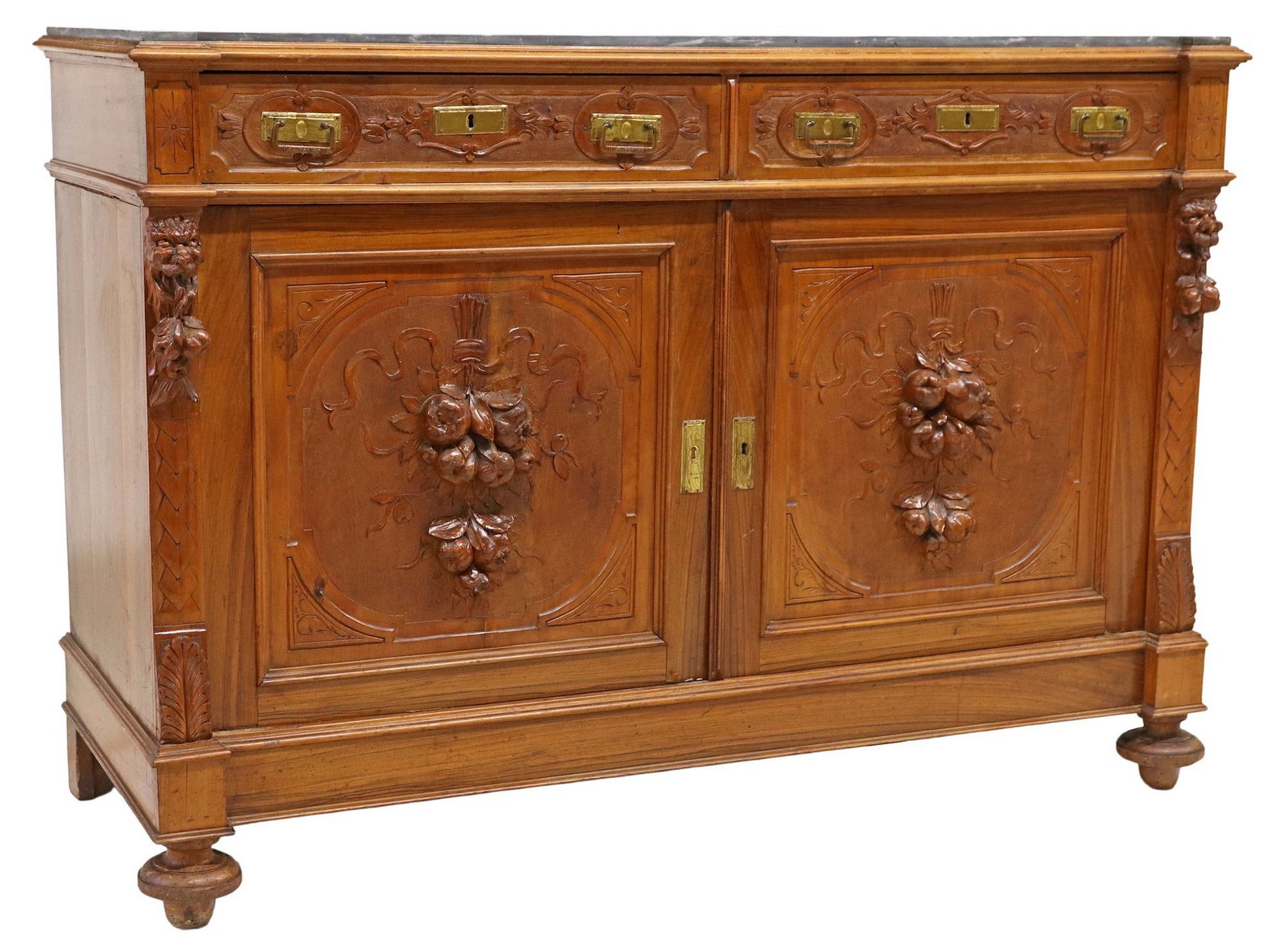 RENAISSANCE REVIVAL MARBLE-TOP FRUITWOOD SIDEBOARD: French Renaissance Revival carved fruitwood sideboard, late 19th c., having shaped marble top, over dual cabinet doors, revealing open interior, carved with figural masks, fruit motifs, and folia