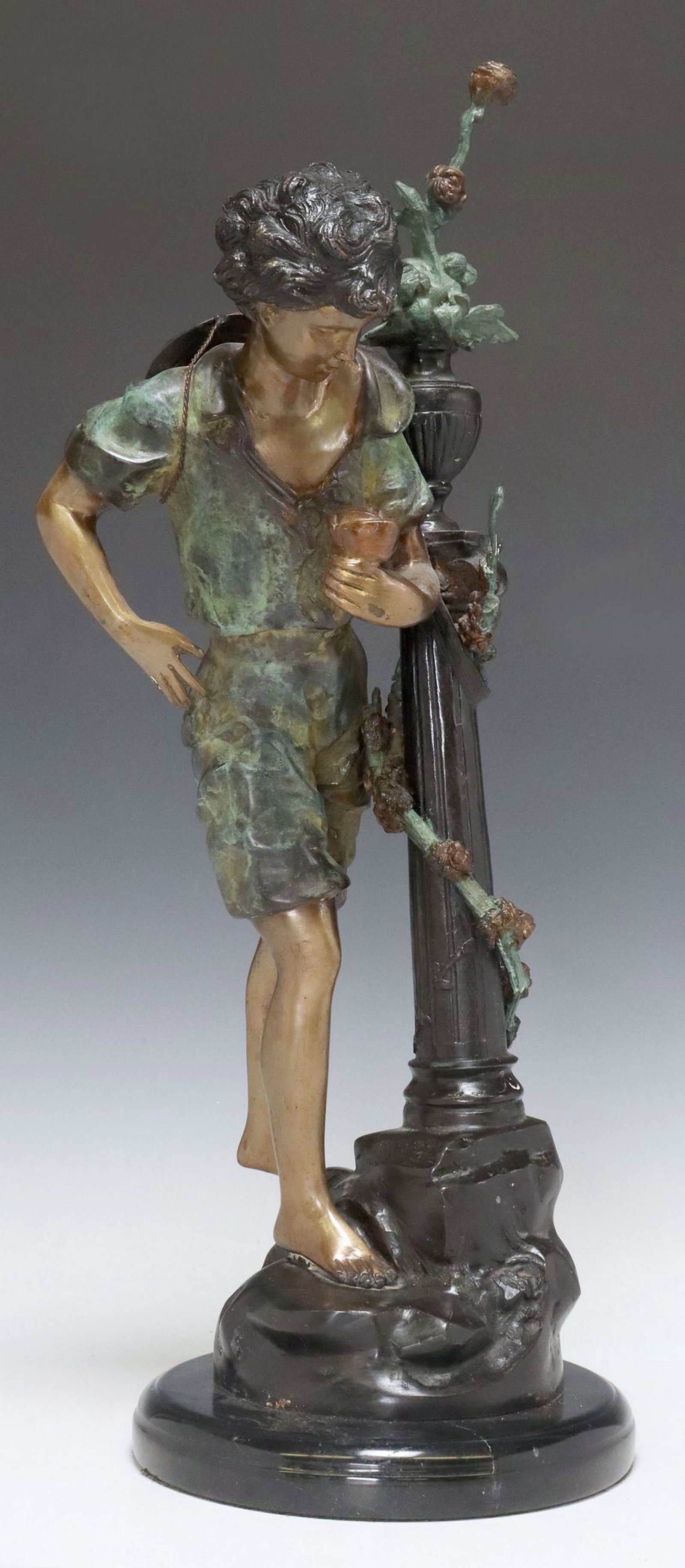 PATINATED BRONZE SCULPTURE BOY WITH A ROSE: Patinated bronze sculpture, Boy with a Rose, on a black marble base, overall: approx 24.25"h, 8.75"diam, 20.25lbs