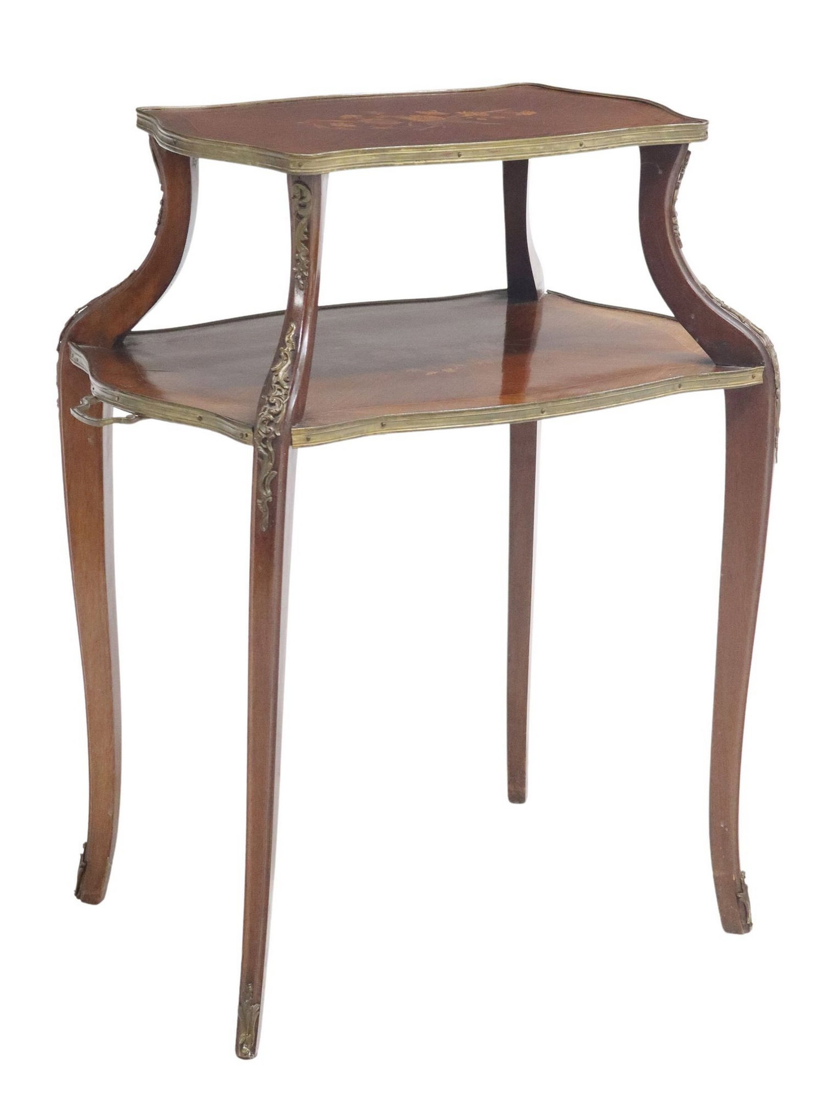 LOUIS XV STYLE MARQUETRY TWO-TIER SERVICE TABLE: Louis XV style tea / service table, 20th c., having two tiers with foliate marquetry on matched veneer and gilt metal trim, top tier on by scrolling supports, lower tier with handle to either side, ri