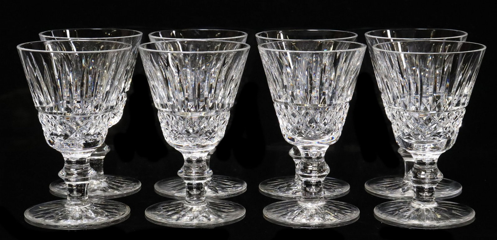 (8) WATERFORD 'TRAMORE' CUT CRYSTAL PORT WINE GLASSES: (lot of 8) Waterford cut crystal port wine glasses, in "Tramore" pattern, each with acid etched mark underfoot, approx 4"h, 2.5"w, 2lbs total **Provenance: A Montgomery, Texas