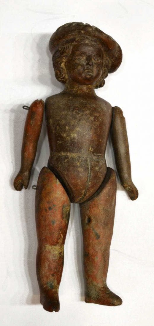 VINTAGE MEXICAN CARVED STONE DOLL MOLD, C. 1930'S: Mexican carved stone doll mold, c.1930's/1940's, curled hair and hat, having jointed arms and legs, used for making papier-mache dolls, overall some loss with age, approx. 17"l, 5lbs