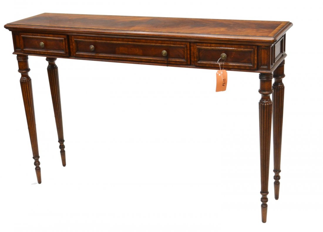 MAITLAND SMITH REGENCY STYLE SOFA TABLE: Maitland Smith regency style sofa table, rectangular with mahogany finish, three frieze drawers, set on fluted tapered leg, 34"h, 52"w, 13"d **Provenance: Lou's Antiques and Fine Furnishings, Tulsa, O