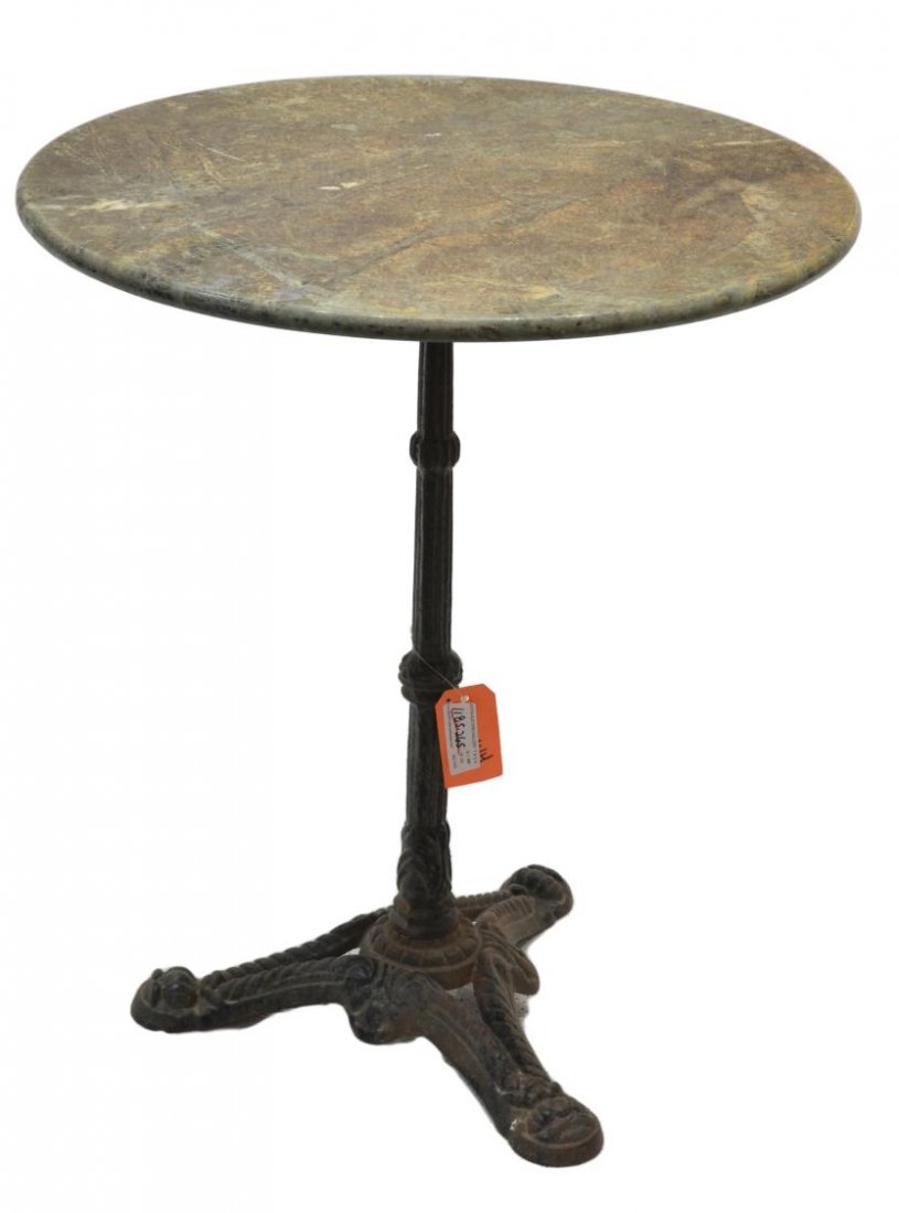 VINTAGE FRENCH MARBLE TOP CAFE TABLE: Vintage French cafe table, early 20thc., circular marble set on cast iron base, 28"h, 23,5"d **Provenance: Lou's Antiques and Fine Furnishings, Tulsa, OK** Start Price: $80.00