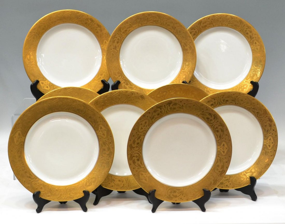 ART NOUVEAU STYLE GILDED PORCELAIN SERVICE PLATES: (set of 9) Fine parcel gilt porcelain dinner plates, wide gilded borders in the Art Nouveau taste decorated with scrolled foliage and budding flowers, several retaining Bergdorf Goodman retail tag), d