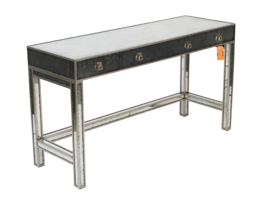 JOHN RICHARD MIRRORED CONSOLE OR VANITY TABLE: John Richard mirrored console or vanity table, rectangular faced with antiqued mirrors, three frieze drawers, mirrored legs and stretchers, 30.25"h, 54.25"w, 18.25"d **Provenance: Lou's Antiques and F