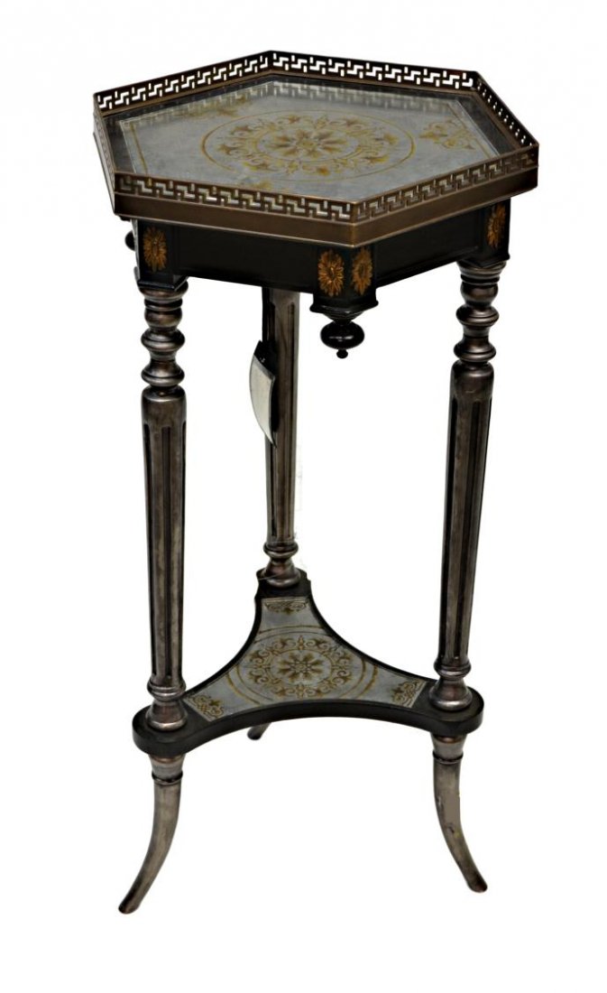JOHN RICHARD EGLOMISE OCCASIONAL TABLE: John Richard hexagon eglomise occasional table with pierced gallery surrounding the top mirrored top, set on three fluted supports with mirrored lower tier and splayed legs, 31.75"h, 16.5"w, 14.5"d **