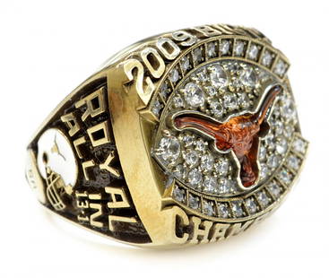 RING:2009 TEXAS FOOTBALL, BIG 12 CHAMP, D.K ROYAL: Ring: 2009 Texas Longhorn Football, Big 12 Champions, raised lettering at one side "ROYAL" inscribed at interior "Darrell Royal", 39.3 grams, approx. size 11.5 **Provenance: From the private collectio