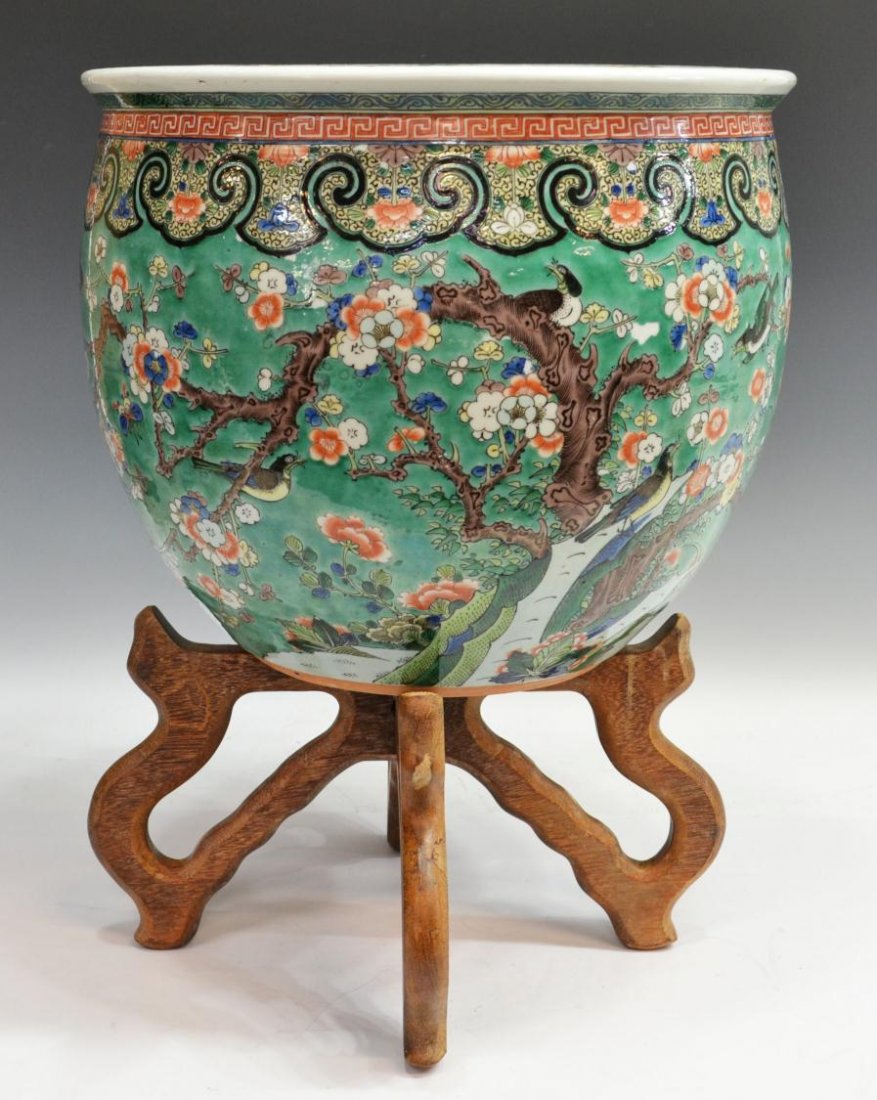 CHINESE PORCELAIN PALM POT, BALINESE ROOM TEXAS: Vintage Chinese enameled porcelain palm pot, from the old Balinese Room, Galveston, Texas, key-fret banding above ruyi lappets on a green ground brightly polychromed with flowering cherry blossom bran