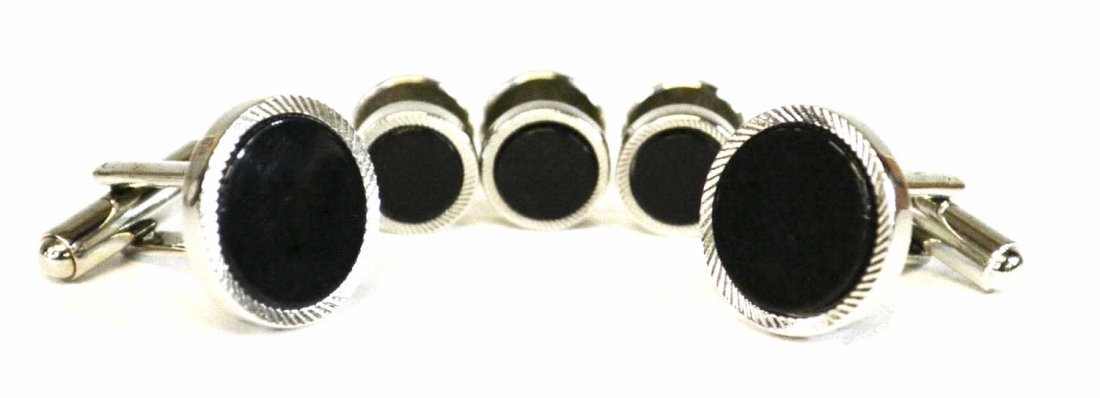 JONATHAN WACHTEL BLACK ONYX CUFFLINKS & STUDS: (set of 5) A Jonathan Wachtel stud set, black onyx and silver tone, comprising a (pair) of cufflinks and (3) studs, lacking one stud, unmarked, in original box with tag, cufflink: .5"diam **Provenance