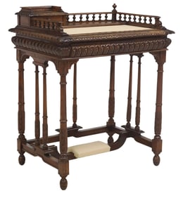 SMALL FRENCH HENRI II STYLE LEATHER-TOP WALNUT WRITING DESK