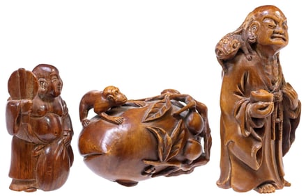 (3) JAPANESE CARVED WOOD GAMA SENNIN OKIMONO, HOTEI NETSUKE, & PEACH PIT