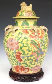CHINESE YELLOW-GROUND EARTHENWARE VASE & COVER