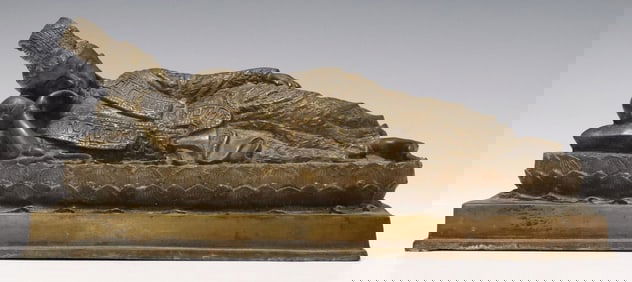 LARGE SOUTHEAST ASIAN PATINATED METAL SCULPTURE RECLINING BUDDHA