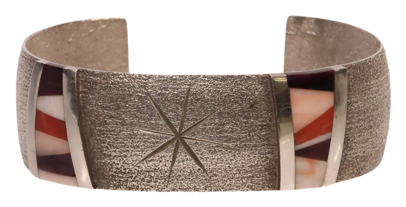 NATIVE AMERICAN TUFA-CAST SILVER & SHELL-INLAID CUFF: Native American tufa cast silver (content unknown) cuff bracelet, signed JOB (?), possibly Jason Begay (Navajo/ Dine, b.1968), two tapering bands of shell inlay, approx 0.75"w, interior: approx 5
