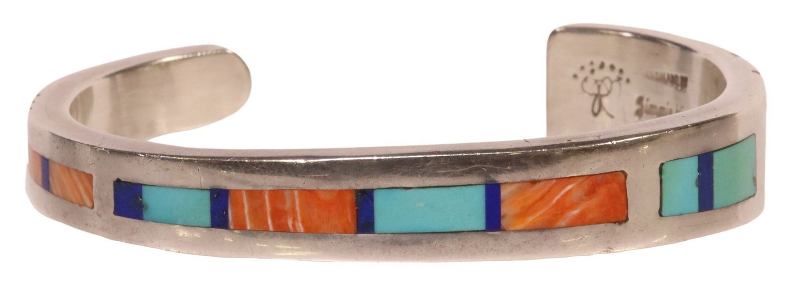 JIMMIE KING JR. & REYNA KING NAVAJO MULTISTONE INLAID SILVER CUFF: Native American sterling silver bracelet, Jimmie King, Jr. (Navajo/ Dine, New Mexico, 1938-2017), tapering cuff inlaid with turquoise, spiny oyster shell and lapis lazuli, approx 0.5"w 