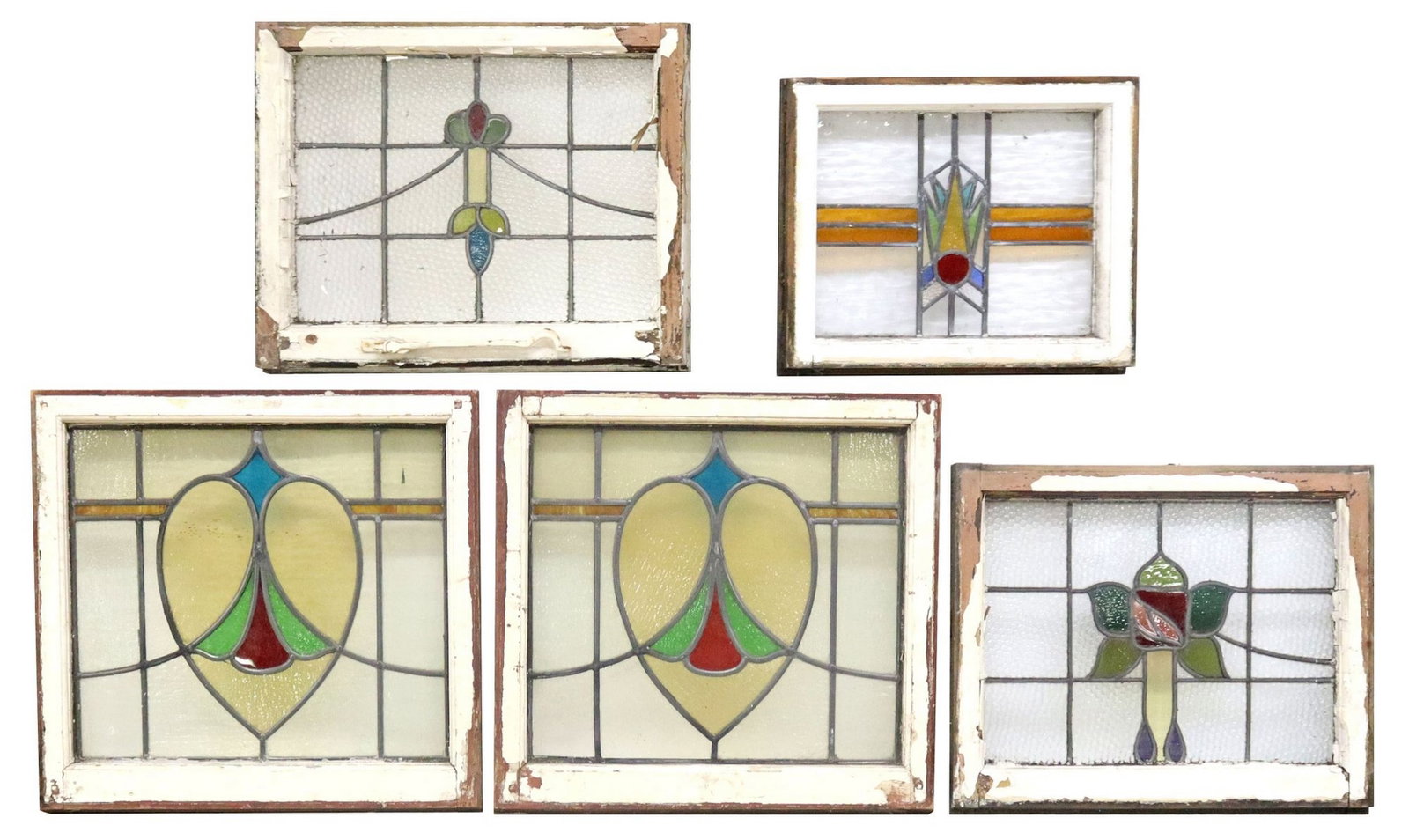 (5) ENGLISH STAINED & LEADED GLASS ARCHITECTURAL WINDOWS: (lot of 5) English architectural stained and leaded glass windows, early 20th c., worn white painted wood frames, encasing clear and polychrome textured glass panels, of varied foliate and geometric d