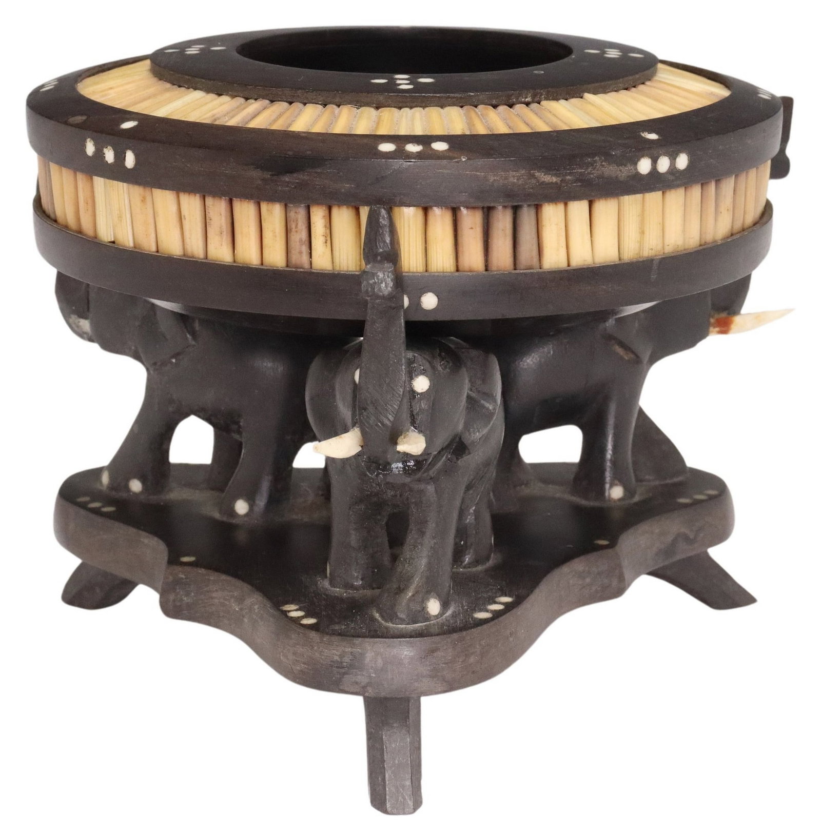 ANGLO-INDIAN PORCUPINE QUILL & BONE INLAID BOWL ON ELEPHANT STAND: Anglo-Indian porcupine quill bowl on stand, shallow circular basin with inlaid bone accents, rising on a tripartite base comprised of three carved elephants, small loss to one elephant tusk, approx 5"
