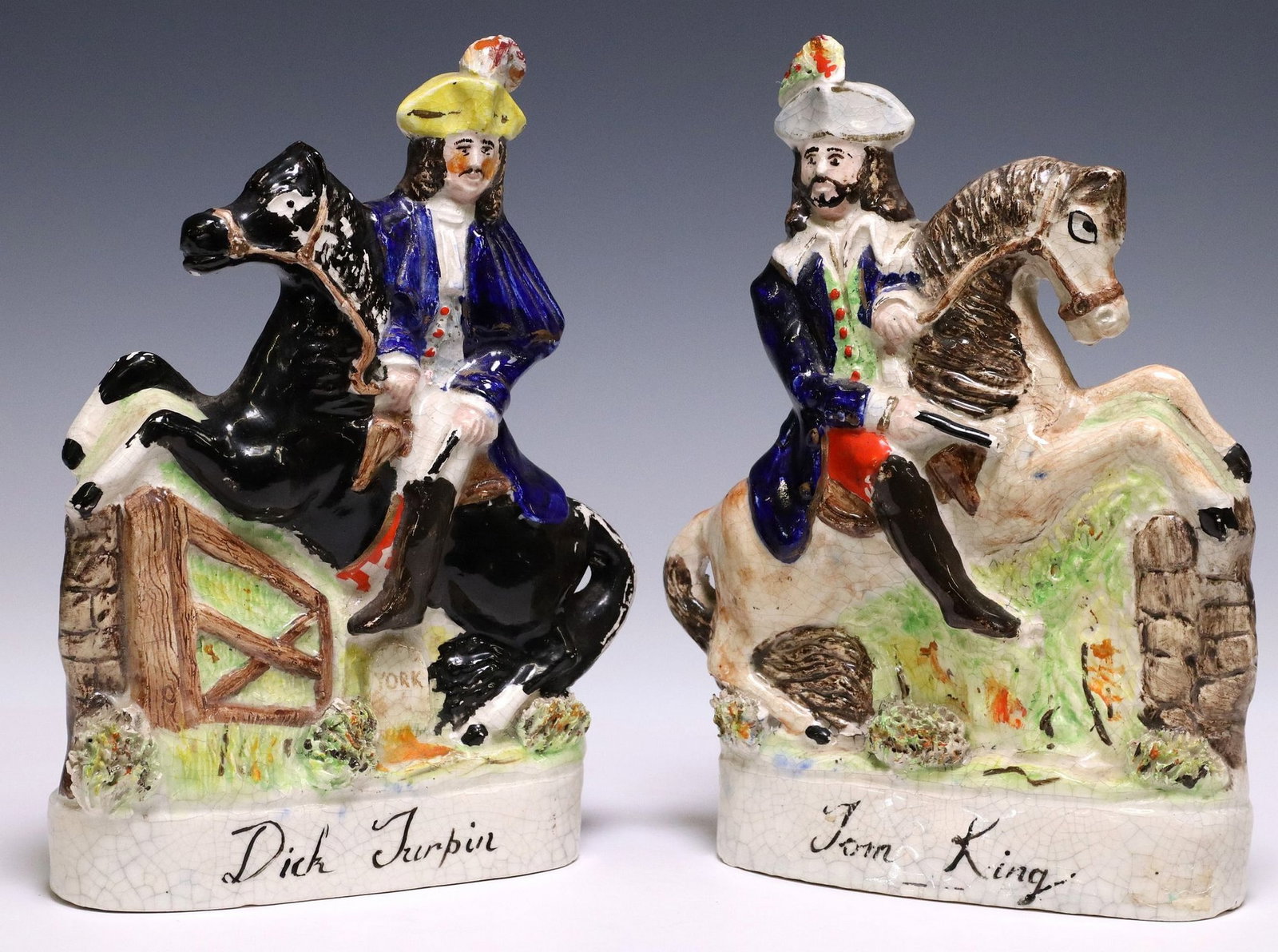(2) ENGLISH STAFFORDSHIRE MANTEL FIGURES ON HORSEBACK: (lot of 2), English Staffordshire mantel figures on horseback, including: (1) Dick Turpin; (1) Tom King, each: approx 10 5/8"h, 8"w, 2.75"d, 4.6lbs total