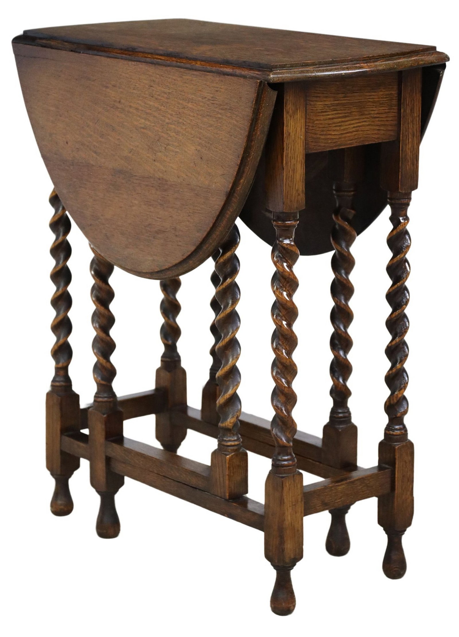 ENGLISH OAK BARLEY TWIST DROP-SIDE TABLE: English oak barley twist drop-leaf table, early 20th c., demilune drop leaves, rising on barley twist supports, joined by box stretcher, gate legs to support open leaves, approx 28.75"h, 12.75&qu