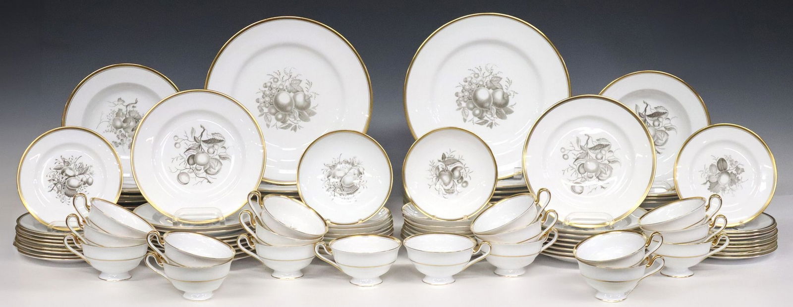 (105) ENGLISH SPODE 'CHATHAM' BONE CHINA DINNER SERVICE: (lot of 105) English bone china dinner service, Spode, in the "Chatham" pattern, based on a c.1810 Regency period pattern, gold-trimmed edge, grisaille transferred arrangements of fruit