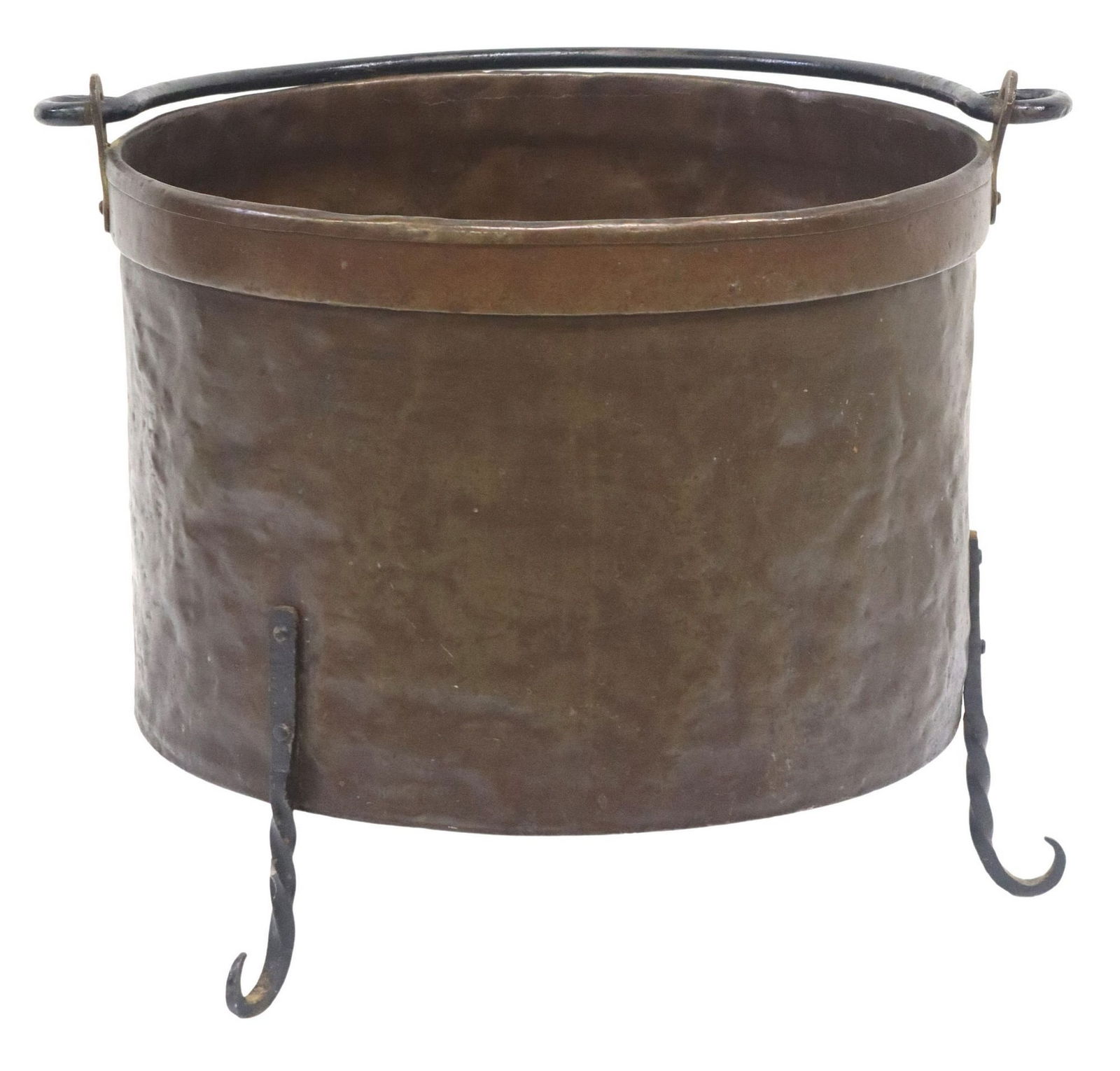 HAND-HAMMERED COPPER & IRON JARDINIERE/ LOG BIN: Large copper jardiniere/ log bin, late 19th c., iron swing bail handle secured on brass mounts, the exterior hand-hammered, rising on tripodal iron scroll feet, approx 17.25"h, 21.25"w,