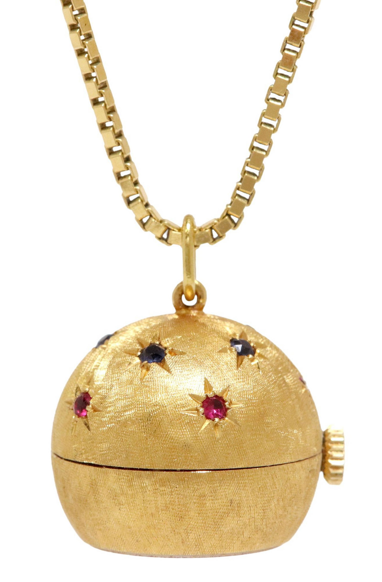 ESTATE BUCHERER 18KT GOLD BALL PENDANT WATCH ON CHAIN: Estate Bucherer 18kt yellow gold (tested) pendant ball watch, Florentine-finish case, blue and red simulated stones, dial with baton indexes, Swiss-made movement, moisture staining to d